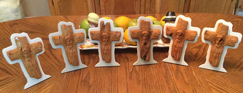 Jesus face cross carvings